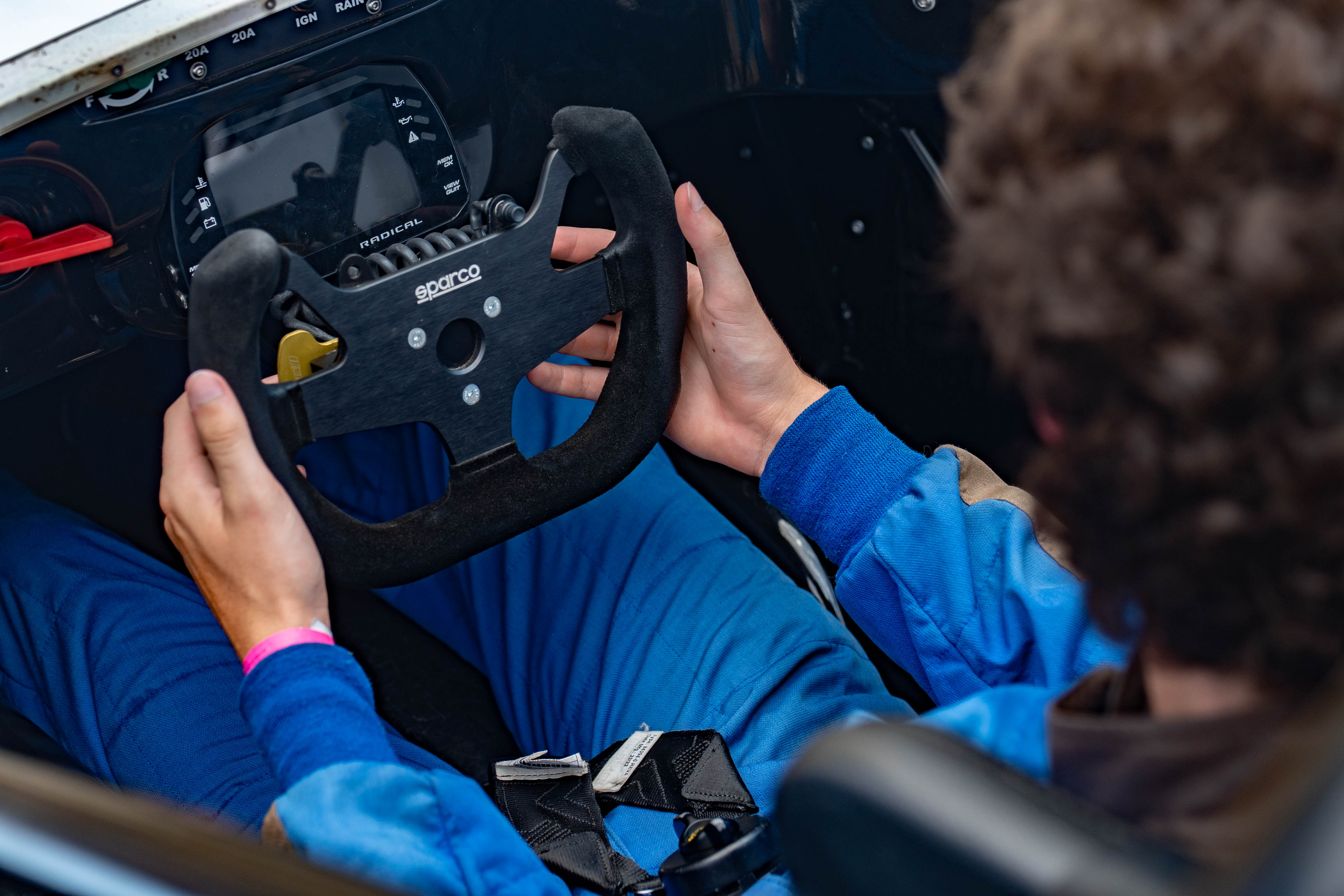 Driver sitting in Radical Racecar